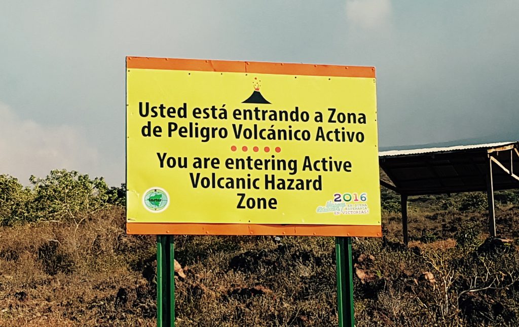 Telica volcano sunset tour sign at entrance