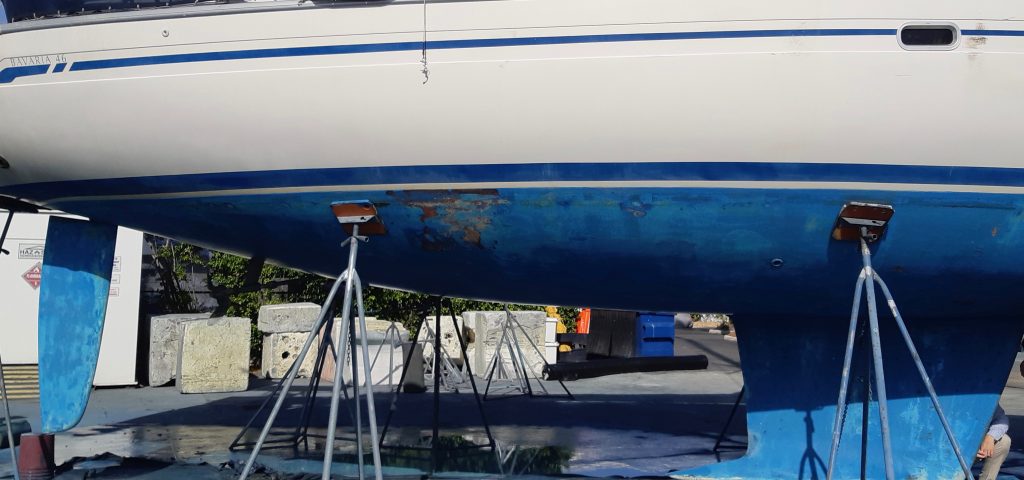 Bottom of our Bavaria 46 foot sailboat before the work is done