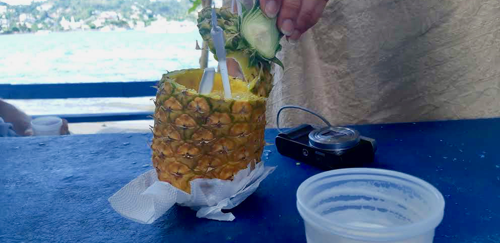 Pina colada in a pineapple