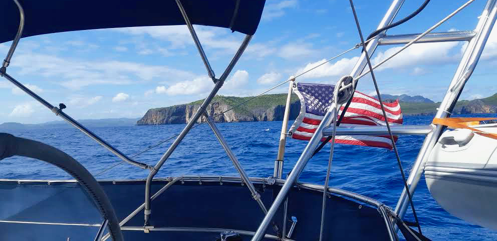 sailing, American flag, land