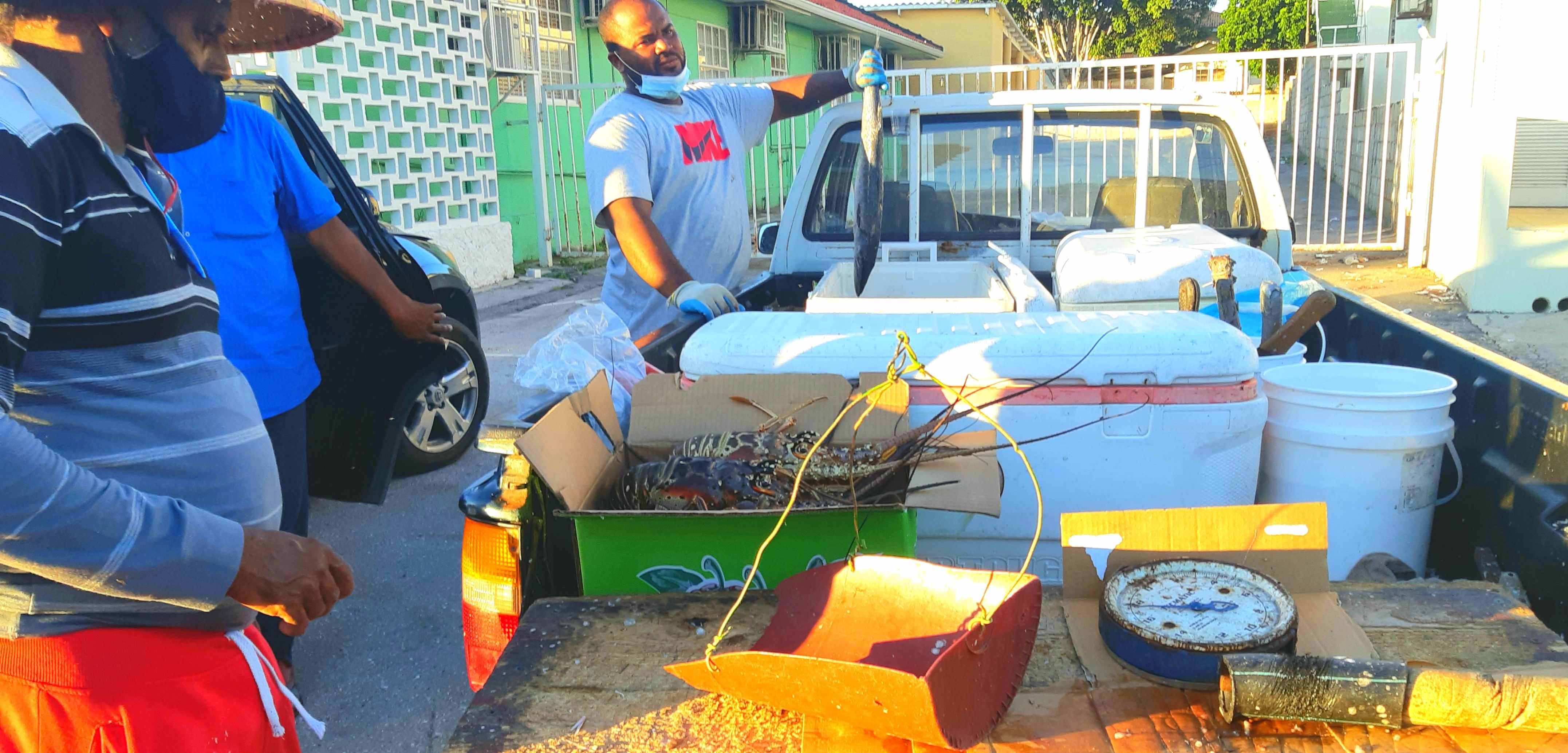 lobster salesman on the side of the road in Curacao