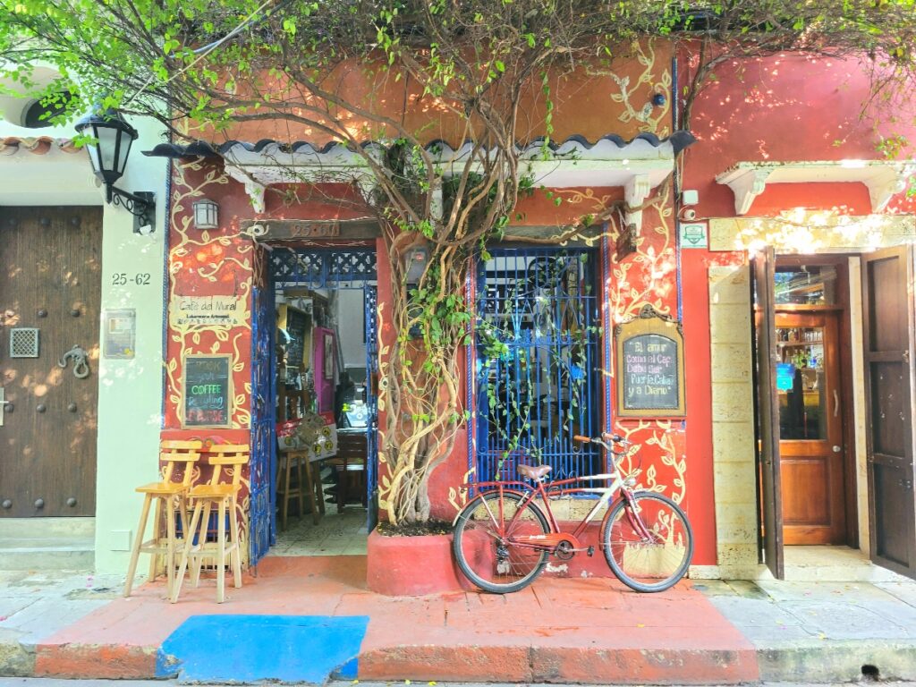 colorful cafe del mural in Getsemani