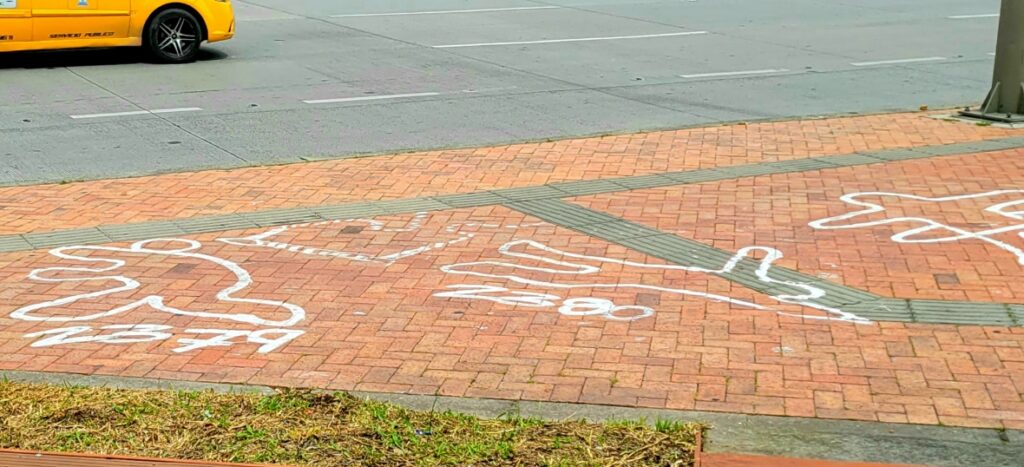 chalk outlines Bogota street art