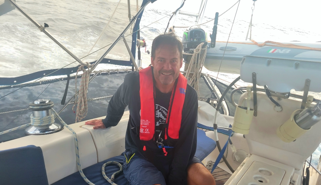 Brian in his life jacket on our passage thirty days at sea from Panama to Polynesia