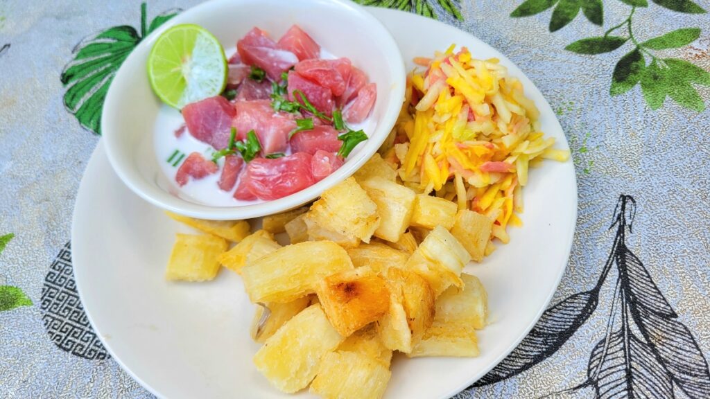 poisson cru, raw fish with coconut milk and vegetables, served with fried yucca