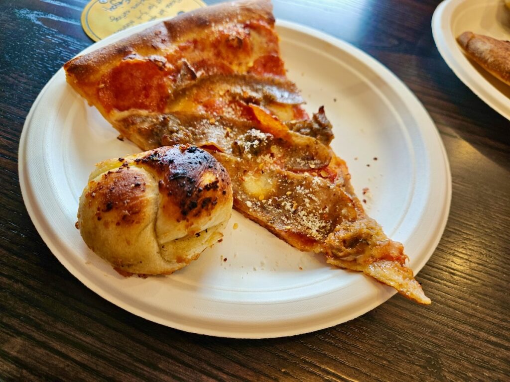 slice of pizza and garlic knot, eating guide Whangarei