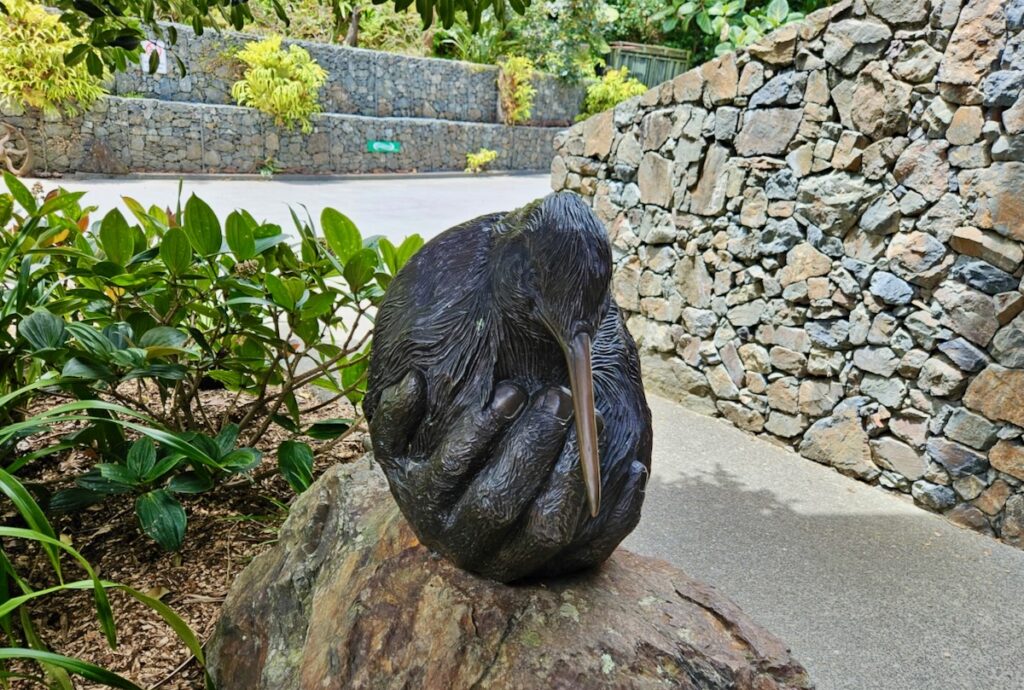 Kiwi sculpture, Kiwi bird held in person's hand