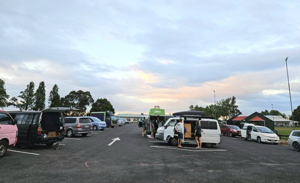 campervan camping New Zealand, full parking lot