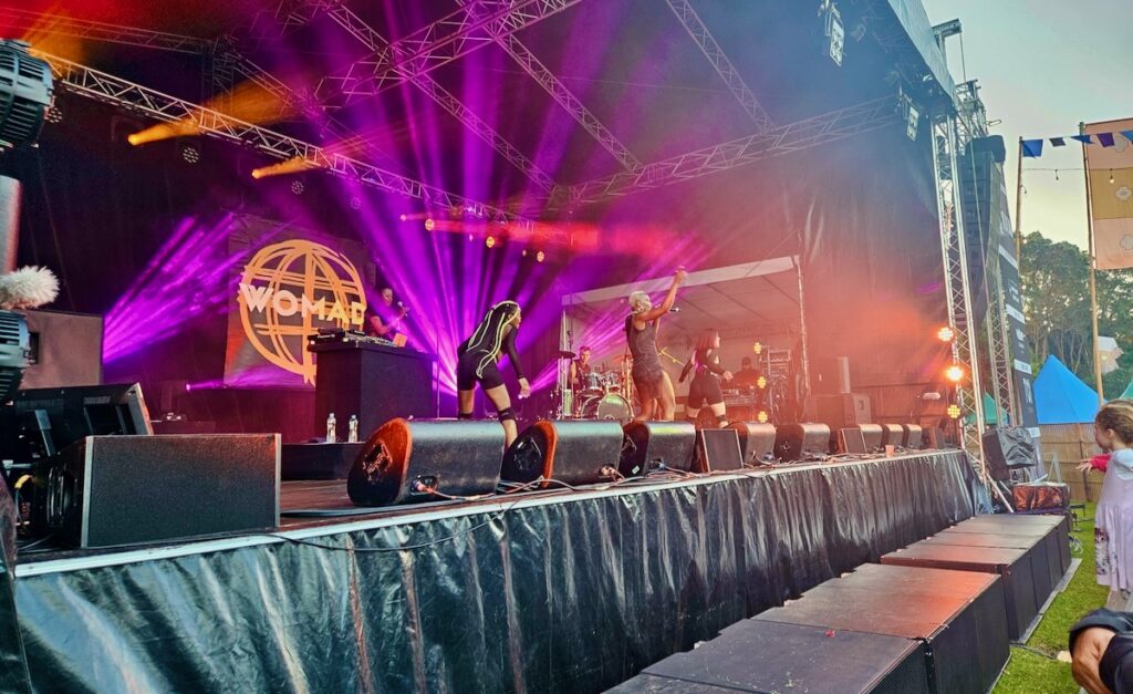 Band onstage at WOMAD fest