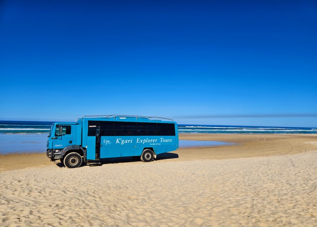 tour bus on beach K'Gari