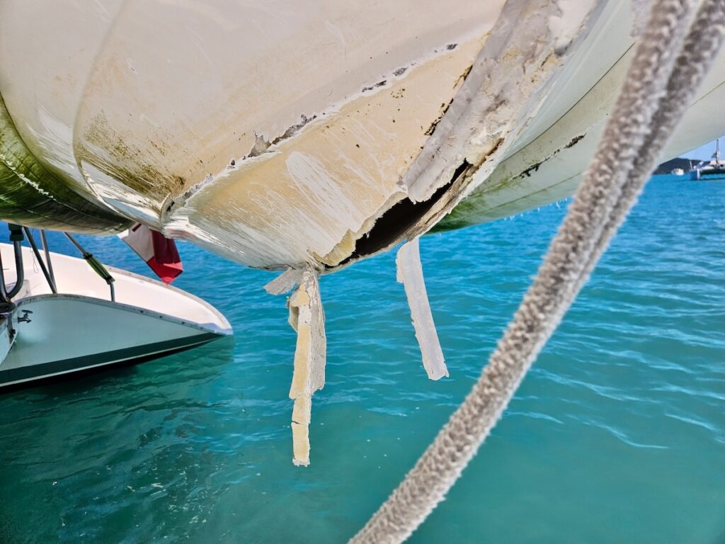 hole, damage, dinghy, misadventures in Queensland