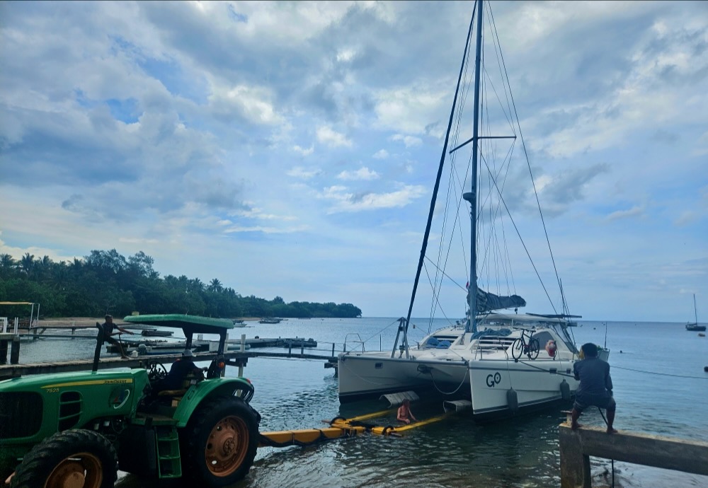 Go catamaran hauling out of water Lombok