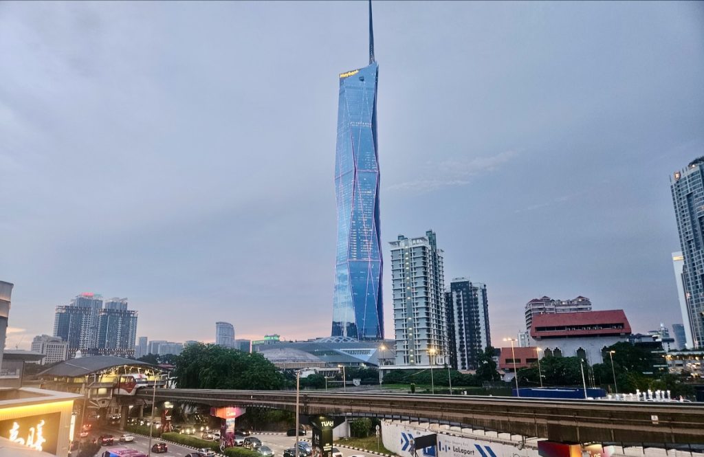KL city scene with skyscraper and rail track