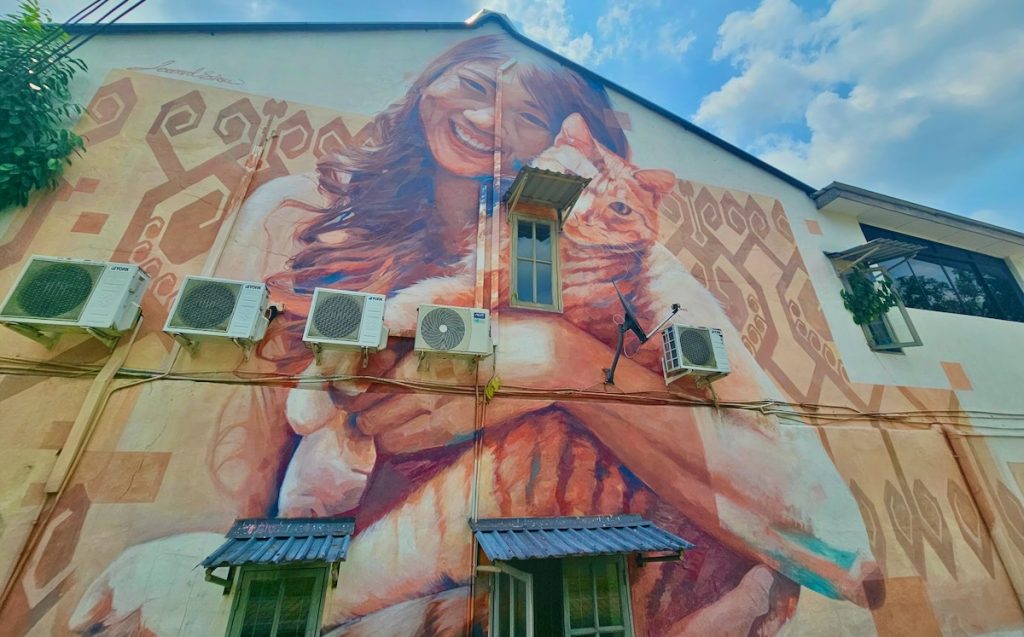 Trip to Kuching Cat and girl mural